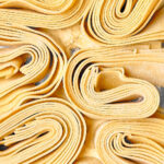 fresh pappardelle pasta nests.