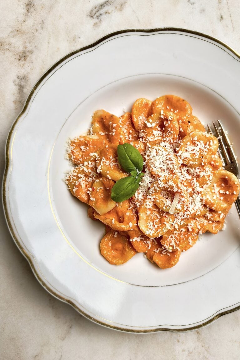 Orecchiette with creamy red pepper sauce and freshly grated parmesan cheese.