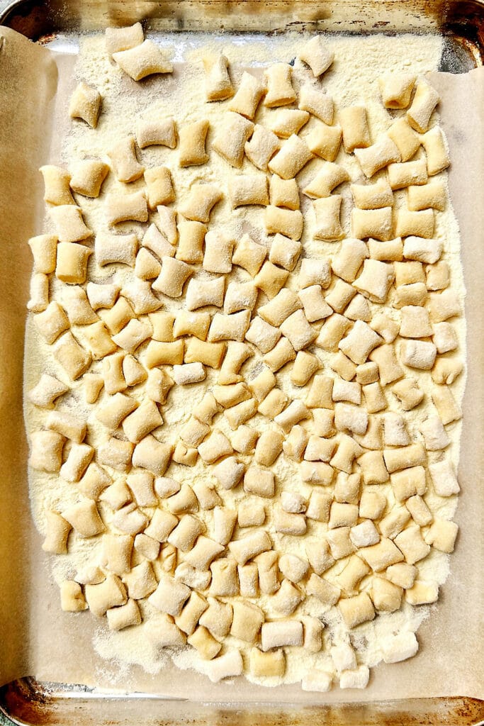 fresh ricotta gnocchi on a baking tray.